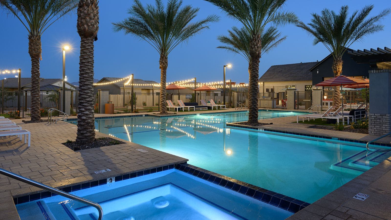 Resort-Style Pool and Spa at Dusk