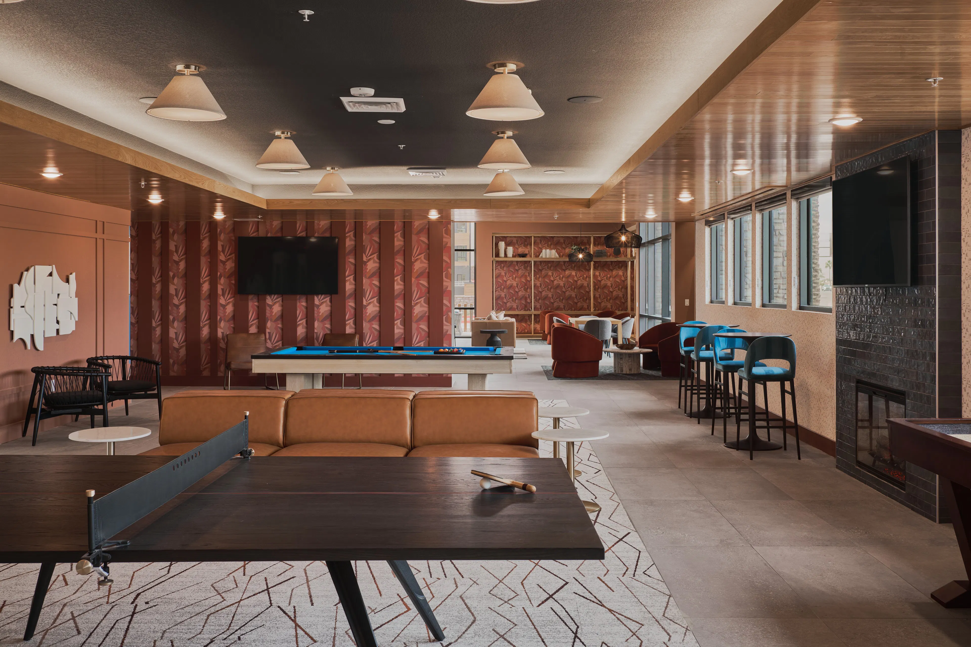 Clubroom with fireplace and casual seating