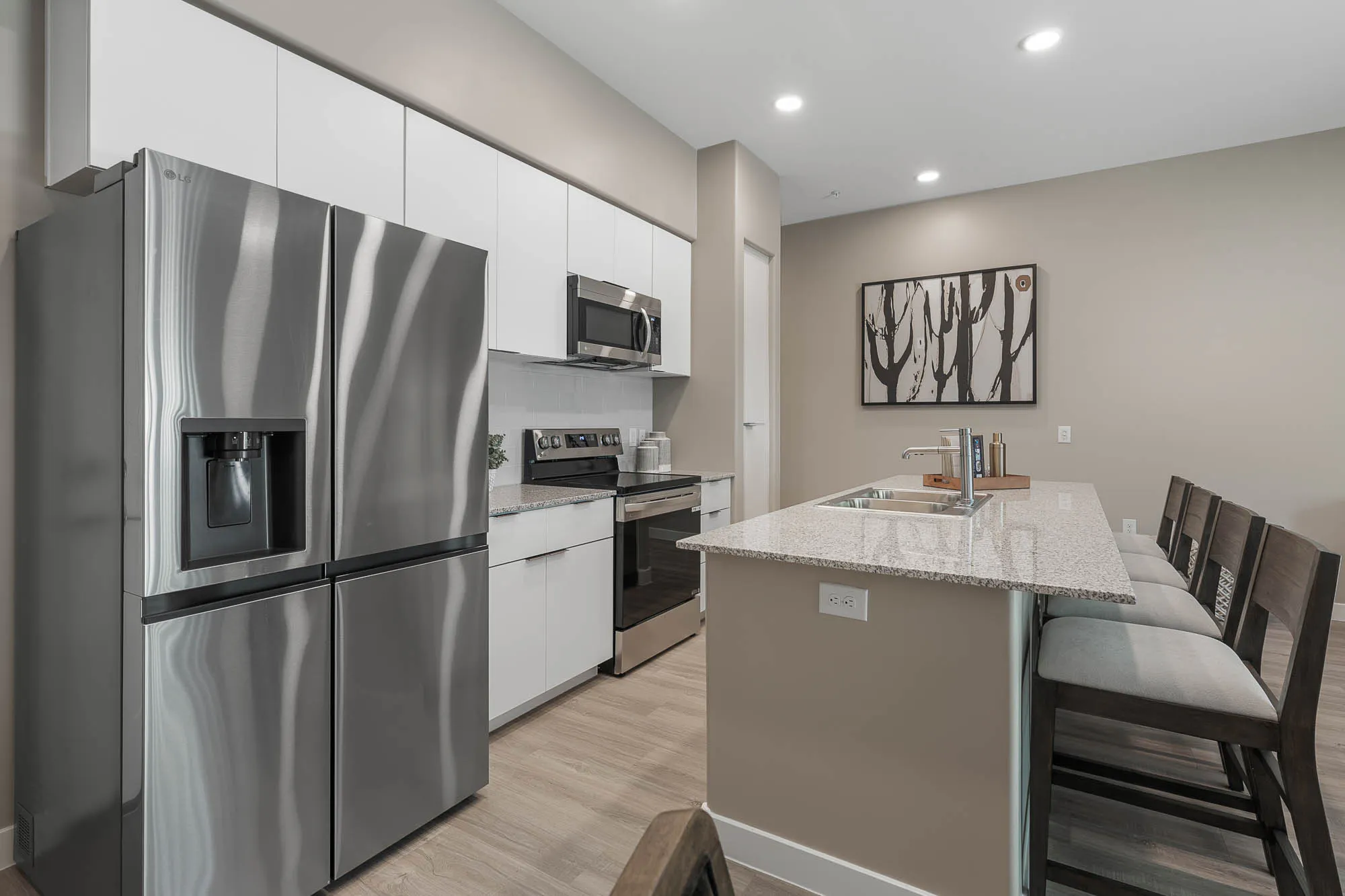 Open kitchen with stainless steel appliances