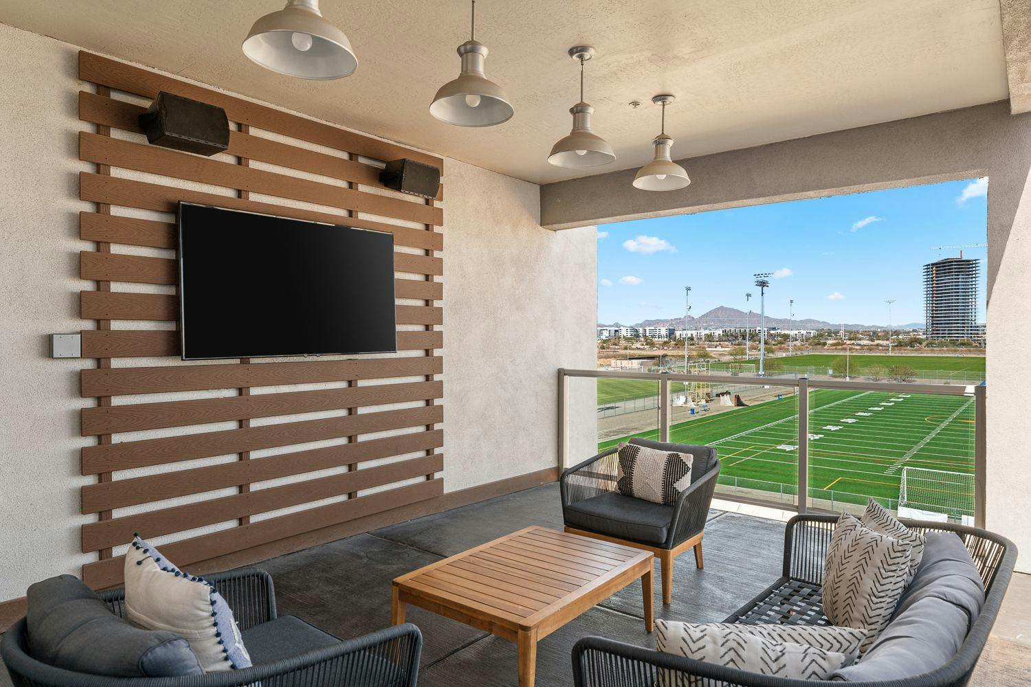 Outdoor Lounge Area with TV